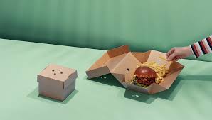 Custom packaging for a London burger shop, featuring eco-friendly materials and innovative designs that enhance the customer experience